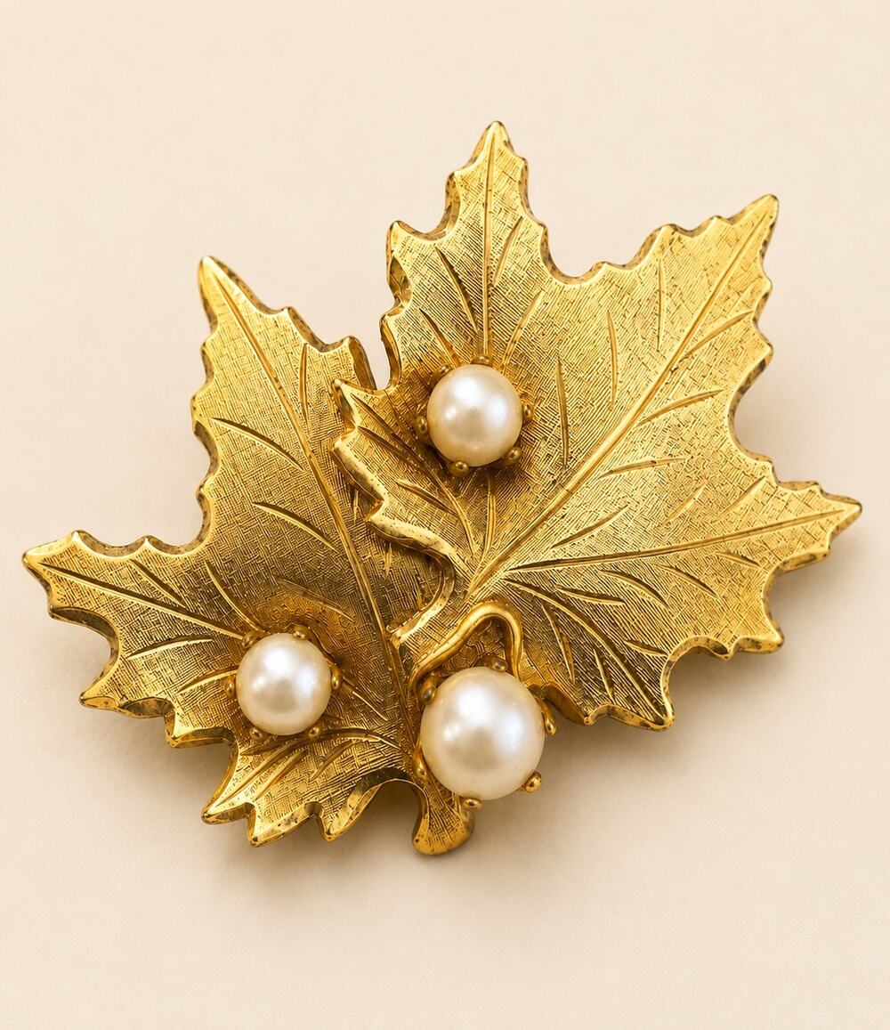 Vintage gold tone maple leaf brooch with pearls